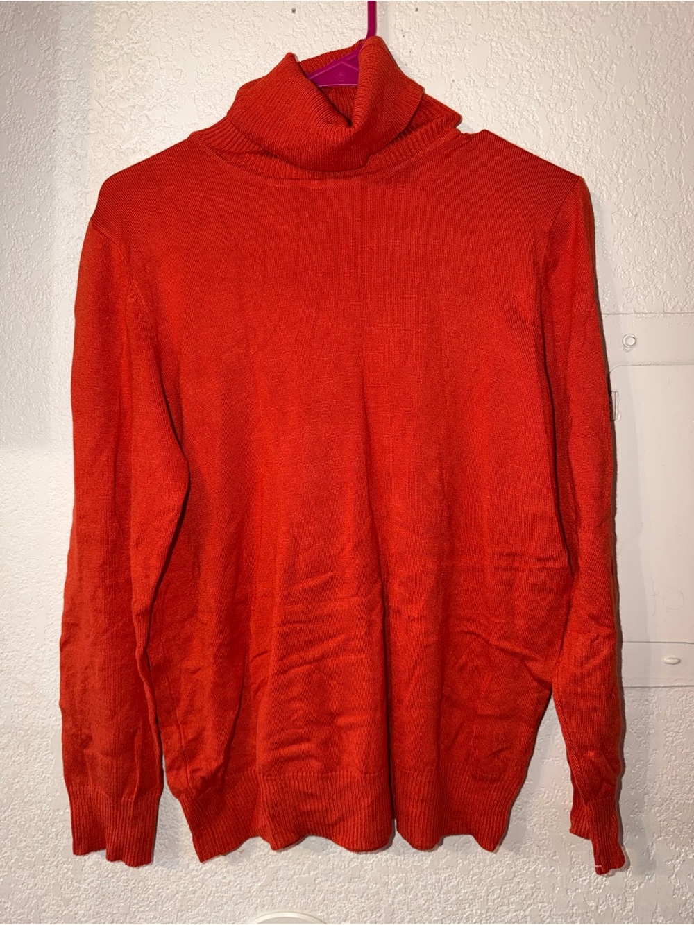 Woman’s Bright orange Turtleneck Sweater